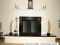 Installed fireplace mantel on a raised hearth