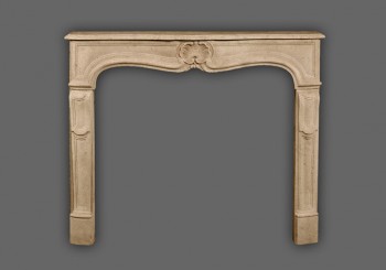 The Provence marble mantel has a simple yet beautiful shell as a center piece and  detailed, slightly angled legs