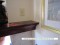 We can customize as needed.  Here is an abut end on the mantel shelf.  The shelf abuts directly into the wall