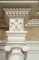 Scrolled capitals top the leg columns. English Marble Mantel