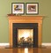 Fireplace mantel with offset legs and dentil molding
