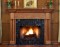 The Princeville custom fireplace mantel has smooth column legs that sit on a square base