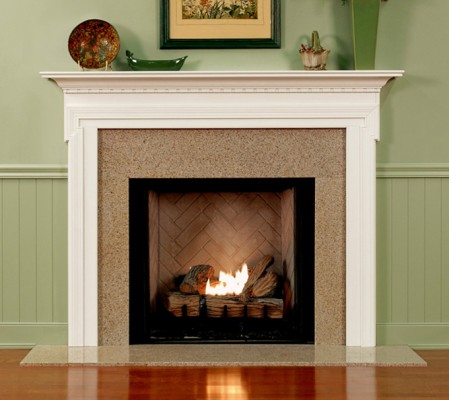 Custom made fireplace mantel with a detailed layered design that will compliment any room