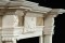 Dramatic tiered top shelves and crown moldings