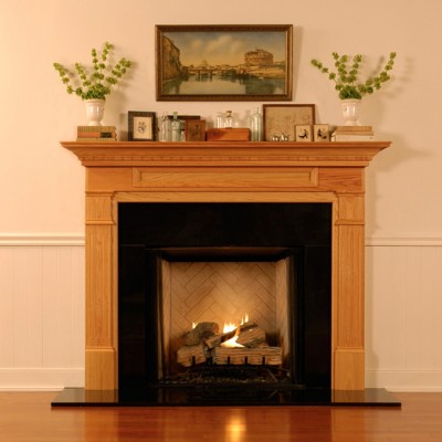 Dentil molding under the top of the mantel shelf