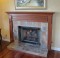 Fireplace Mantel in Cherry with Nutmeg finish.  Customer notched mantel legs for the hearth