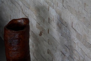 Split Face Stones are sold by the square foot and are attached to a mesh backing.  Most customers order 5 to 8% over the exact square footage. Back splash, feature wall, fireplace surround, and more
