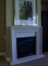 Ventura modern stone mantel with facing & hearth