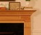 This fireplace mantel is offered in six wood types and several color finishes