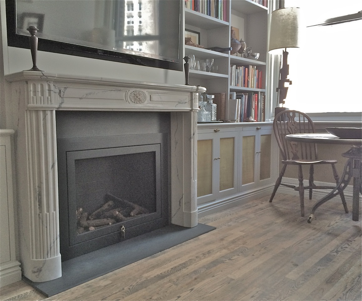 A sophisticated choice for a residential library White Marble Mantel in a Library