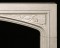 Classic Gothic or Tudor arch is a key component of this limestone mantel surround.
