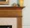 The Killen mantel is marked by simple lines, and fluted mantel legs.