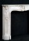 Louis XV styling in all details of this marble mantel