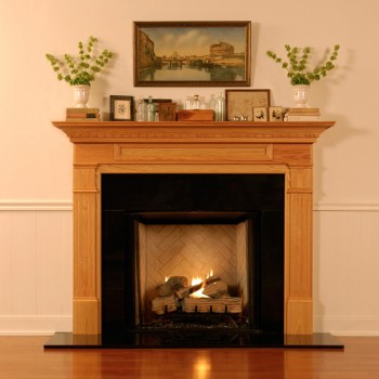 Dentil molding under the top of the mantel shelf
