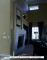 New, taller stone mantel with customized hearth and stone overmantel
