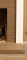A detailed image of a wood mantel with 'extended returns.'