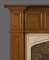 This mantel was matched with our limestone surround #200 and tan brown granite facing