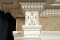 Decoratively detailed moldings and acanthus leaves featured