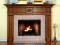 A striking and colonial design, the Columbia Fireplace Mantel has sunburst appliques and colonial style dentil molding.