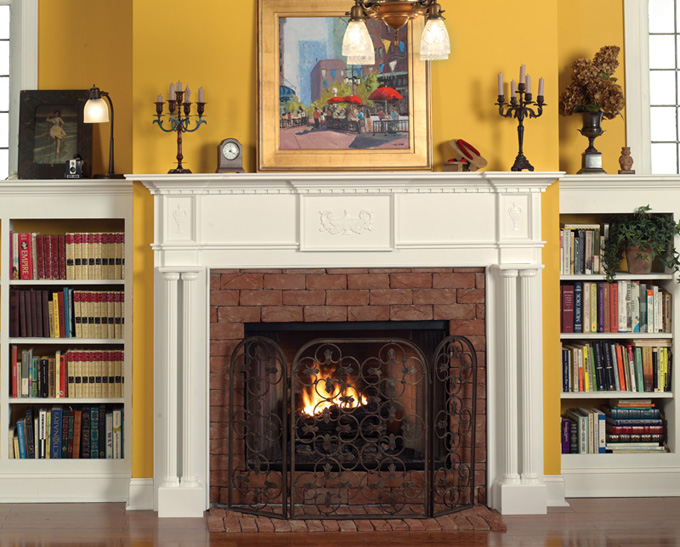 Framing creates insets above the column legs and sets off the lantern appliques on this fireplace mantel.