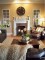 Wood Mantel displayed for design inspiration.  The decorative applique was left off the mantel and the homeowner first installed wood paneling as a backer around their brick, then they installed the mantel for a great look