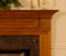 Offset trim molding in the header of this tradtional fireplace mantel