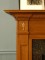 The St. George Wood Mantel has fine details, dentil molding, and lantern applique ornamentation.