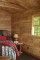 Western Red Cedar paneling in this rustic cabin bedroom - real plywood paneling