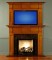 Order two mantels, one for use on top of the other as an over-mantel to frame a television, mirror or work of art.