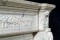 Neoclassical design elements are featured on this ornate French Marble Mantel