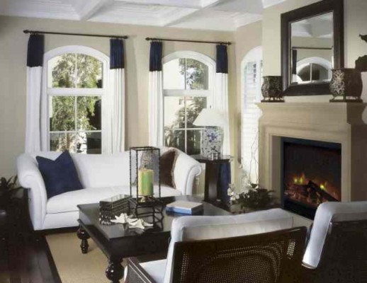 An electric fireplace can be fitted into a mantel, to bring warmth and ambiance to any room, including a formal living room.
