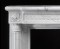 Acanthus leaf boss, with fleuron, decorate the corners, above the Corinthian Capital on our Louis XVI Marble Mantel