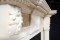Marble Mantel shelves are tiered and cantilevered