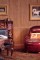 Highland Oak beaded paneling above a chair rail with wainscoting height used below