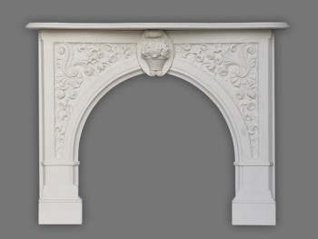 Beautiful sculpted arch is surrounded by beautiful florals in our Andrea English Marble Mantel