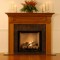 There is dentil molding and decorative trim molding on this mantel