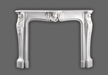 A fine representation of Louis XIV styling.  A beautiful French Marble Mantel. Italian Bianco marble