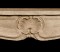 A delicate acanthus leaf and shell design mark the center of this Country French Marble Mantel