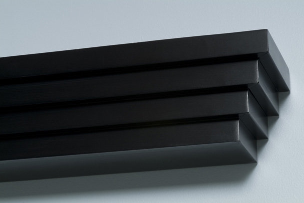Tiered, modern lines mark this modern mantel shelf