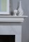 Marble facing with a wood mantel shelf