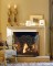 The Ventura Stone Mantel beautifully frames a fireplace, creating a focal point