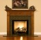 The Hanceville fireplace mantel is shown here with a granite facing kit.