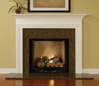 Installed wood mantel with a granite facing kit.