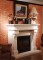 Electric Fireplace insert shown with traditional mantel, shown for design inspiration