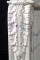 Beautifully detailed acanthus leaf design tops each leg of this Louis XVI Marble Mantel