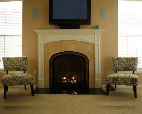 A beautiful arched custom wood fireplace mantel. The Camden.