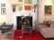 The fireplace mantel with dentil molding painted white