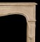 Simple cartouche panels mark the top and legs of this marble mantel.